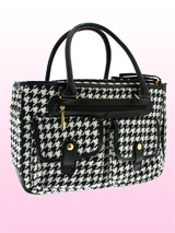Houndstooth Pet Carrier - A classic Houndstooth design Pet Carrier but with up to the minute styling. Designer fabrics and trims combine to create a chic carrier fit to show off your pet while complementing your wardrobe. The Houndstooth carrier is specifically designed to make your pet's journey as comfortable and as safe a...