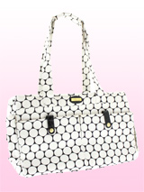 City Chic Pet Carrier - The City Chic Pet Carrier is right on trend and features a sharp Urban look as seen on all the cat walks this season. Designer fabrics and trims combine to create a chic carrier fit to show off your pet while black and white can be easily cordinated to match your own outfit. The City Chic carrier is...