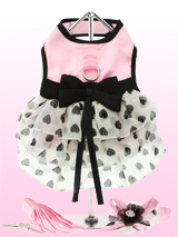 Pink Satin & Hearts Chiffon Harness Dress, Lead & Hat - ''Pure Elegance'' describes this, one of a kind, designer harness dress. Made from highest quality pink satin and three tiers of delicate white chiffon skirting printed with black hearts. As a finishing touch a beautiful black satin bow surrounds the waist. It has a sturdy reinforced D-Ring and a do...