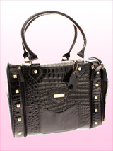 Monte Carlo Pet Carrier - This stunning bag is ideal for those who want to make a statement! Its sleek curves and colour makes it a very stylish, yet very practical pet carrier. Unlike ordinary bags, the Monte Carlo Pet Carrier is specifically designed to be a pet carrier, and can be used in several ways to make your pet's j...